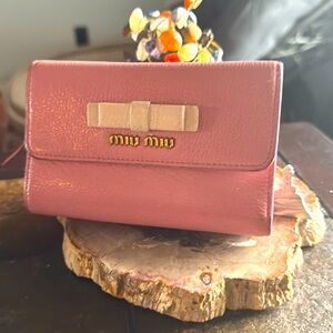 Authentic MIU MIU! It’s an excellent condition just a beautiful wallet.